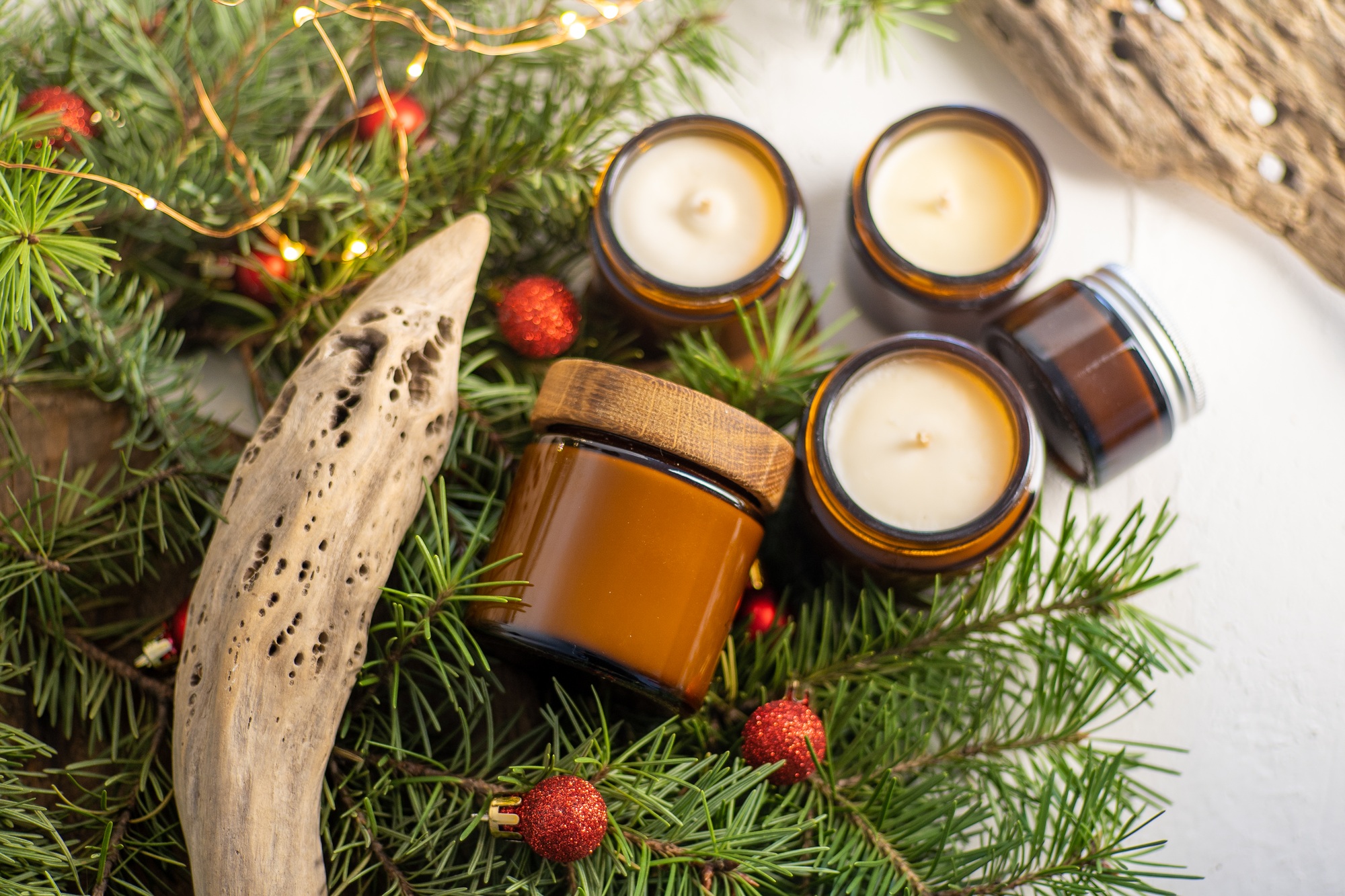 Soy candles burn in glass jars. The evening is dark. Aromatherapy and relaxation. Comfort at home